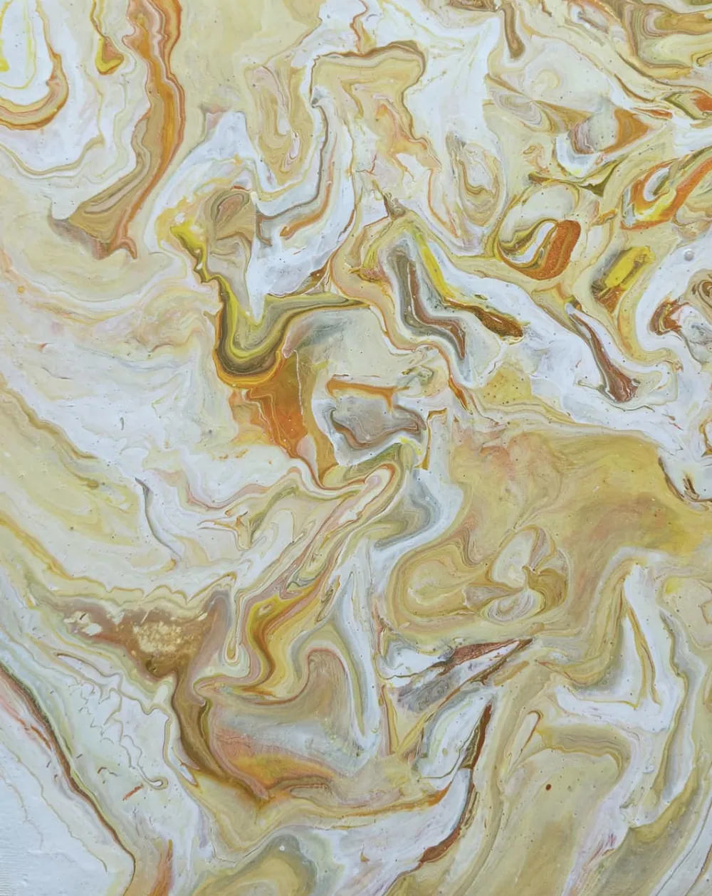 Cream, white, and soft gold marbling like polished alabaster.
