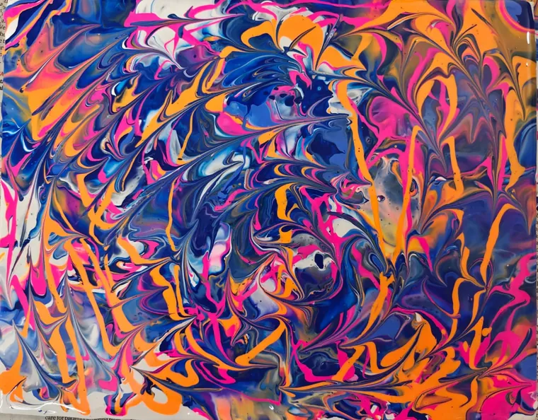 A swirling tangle of pink, blue, orange, and violet poured paint.