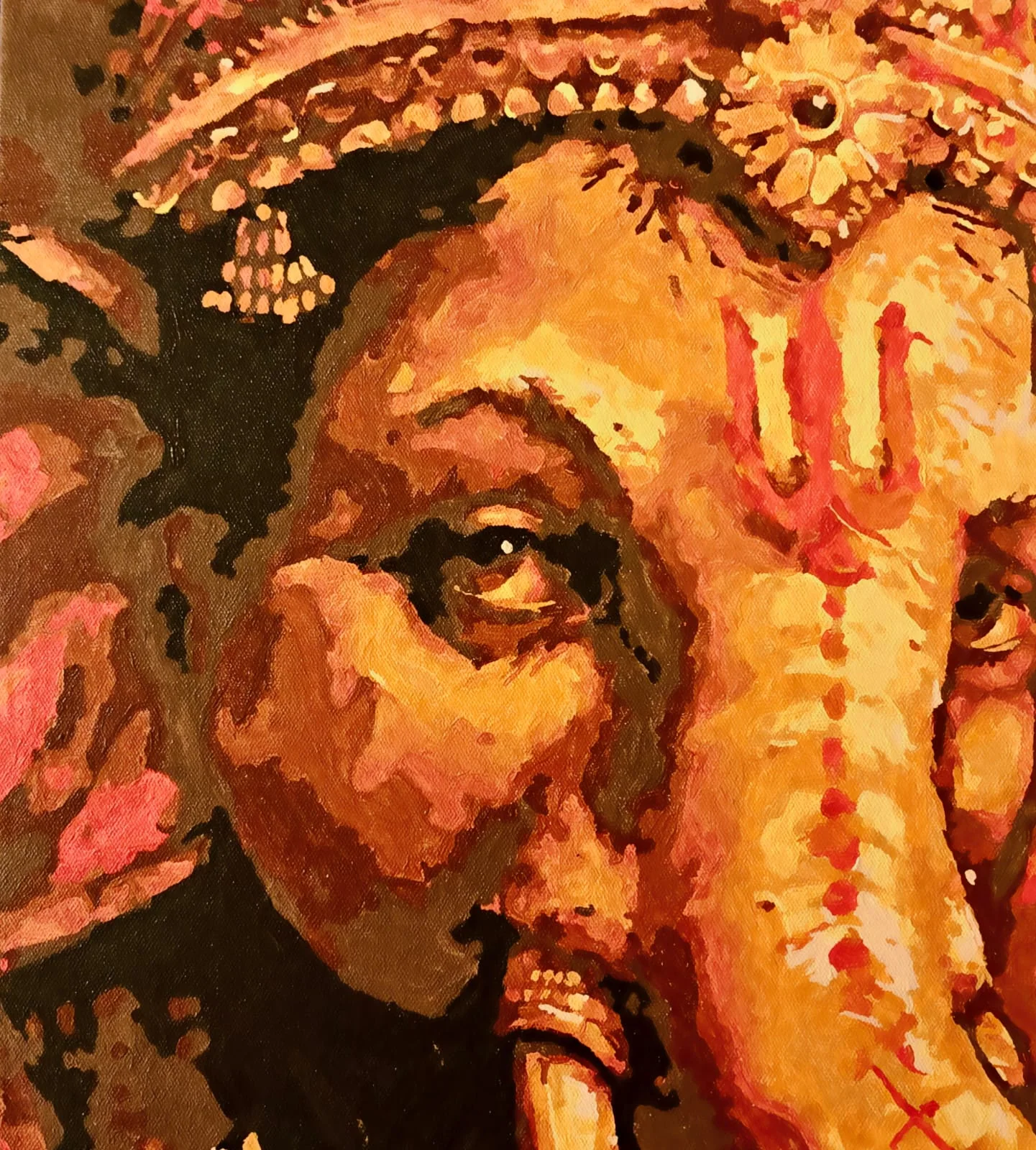A portrait of the god Ganesha in warm oranges, ochres and reds, cropped close: a jewelled crown across the top, one eye looking out from a fold of the brow, a red trident mark on the forehead, the trunk descending with a dotted red line along it, and a white tusk at the lower edge.