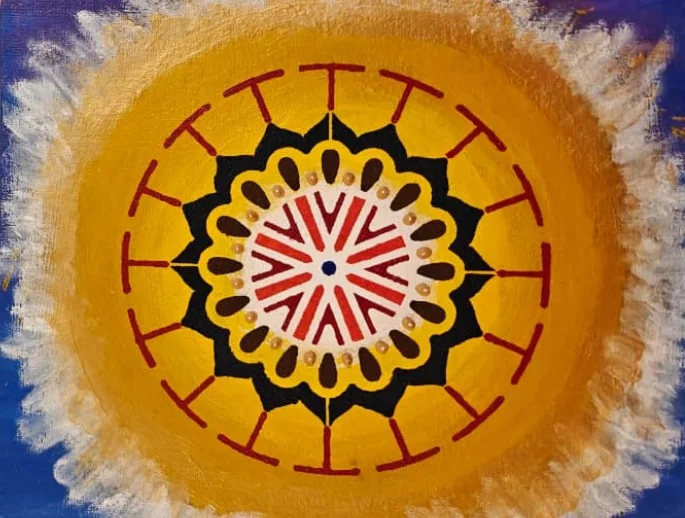 A gold and oxblood sun-wheel mandala with a radiant black-and-red centre, ringed by a spoked border.